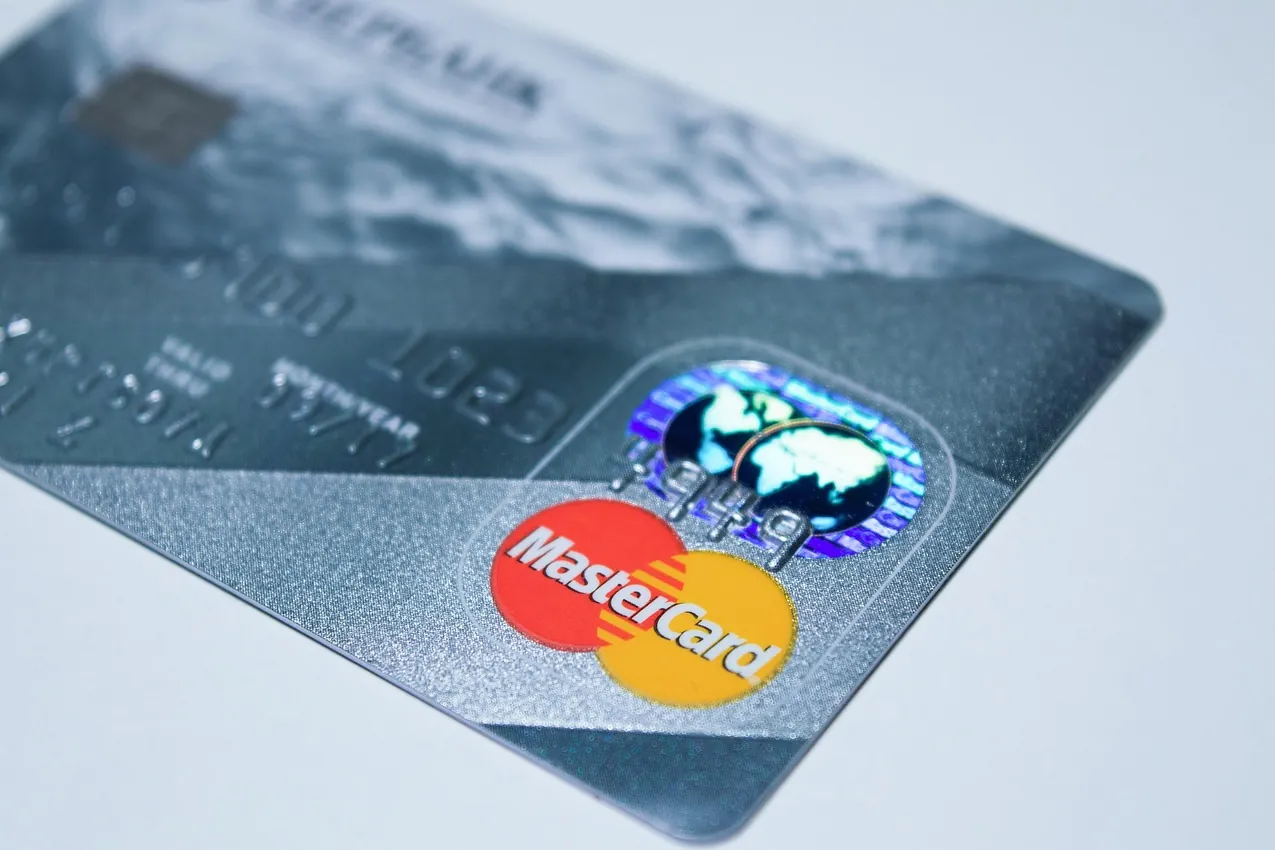 A plastic card, payment, money