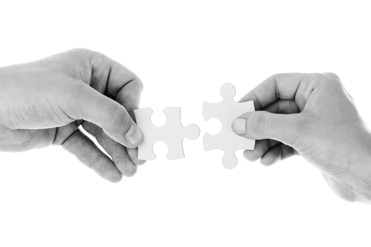Hands, puzzle pieces, connect